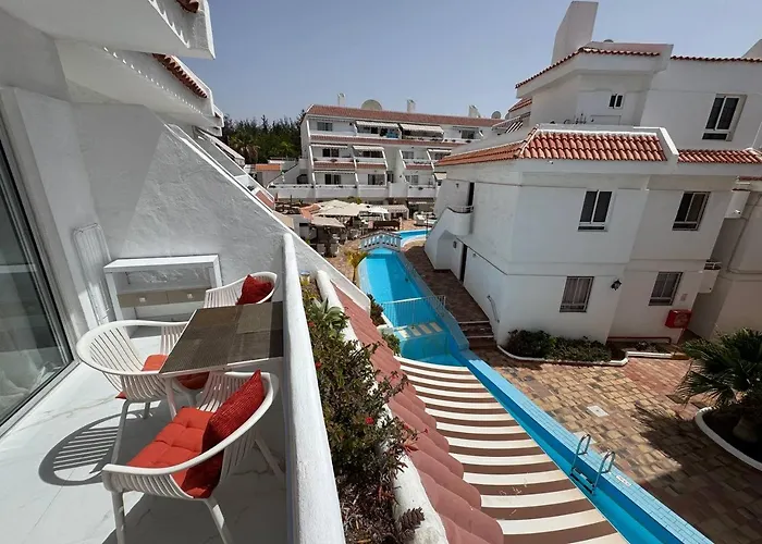 в Playa De Americas